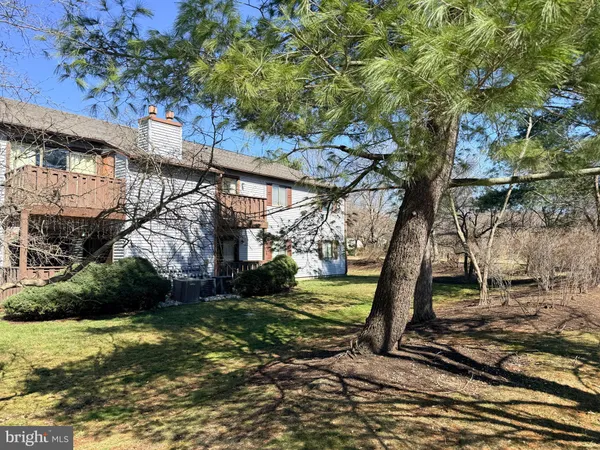 a view of a yard in front of house