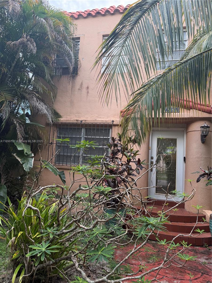 901 Southwest 19th Avenue Miami, FL 33135 - Photo 16 of 60 a view of a house with a yard