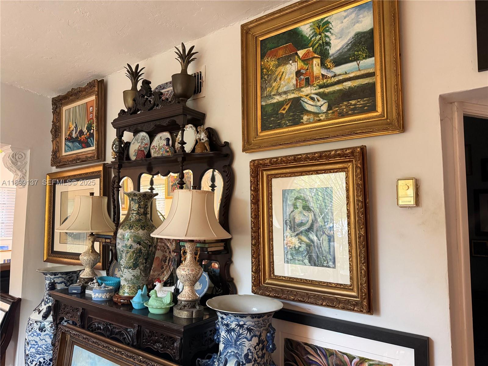 901 Southwest 19th Avenue Miami, FL 33135 - Photo 29 of 60 a front view of a house with lots of stuff