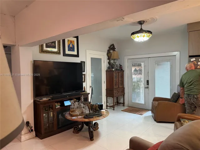 a bathroom with a toilet a sink and view