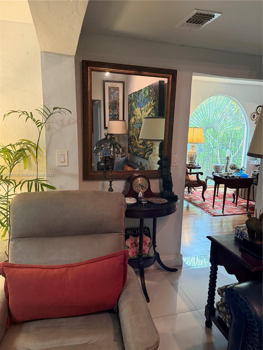 901 Southwest 19th Avenue Miami, FL 33135 - Photo 37 of 60 a living room with furniture and a large window