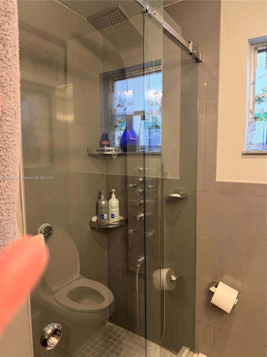 901 Southwest 19th Avenue Miami, FL 33135 - Photo 38 of 60 a bathroom with a sink toilet and shower