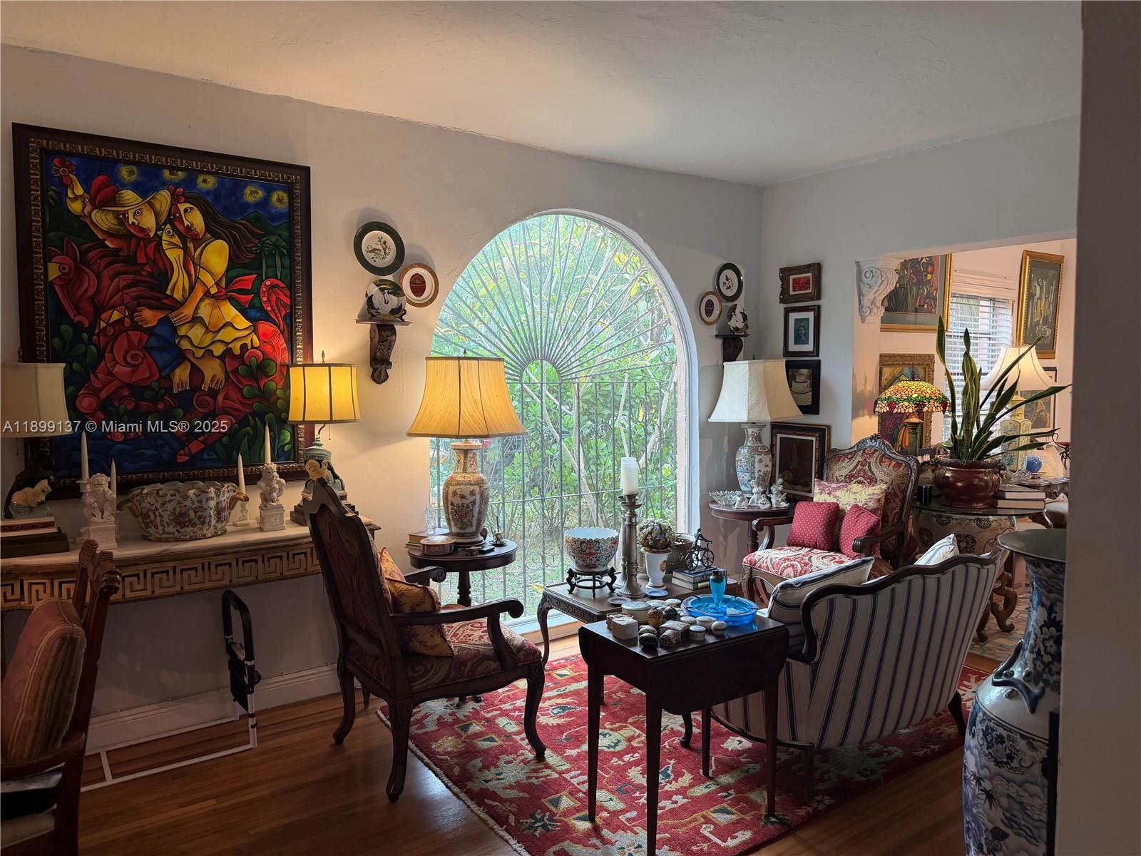 901 Southwest 19th Avenue Miami, FL 33135 - Photo 44 of 60 a living room with furniture a window and a table