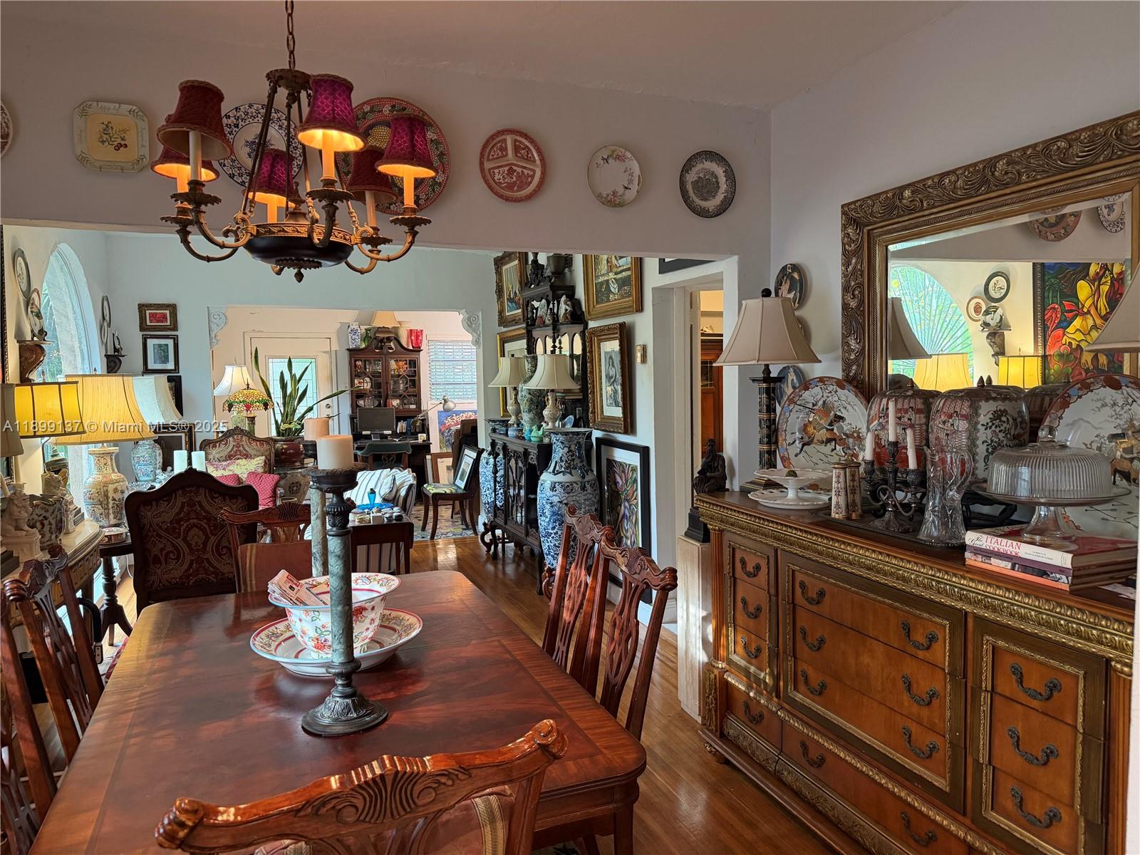 901 Southwest 19th Avenue Miami, FL 33135 - Photo 48 of 60 a view of a dining room with furniture one side kitchen view and wooden floor