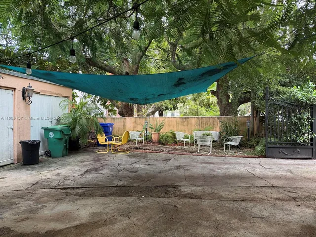 a room with lots of furniture and clutter