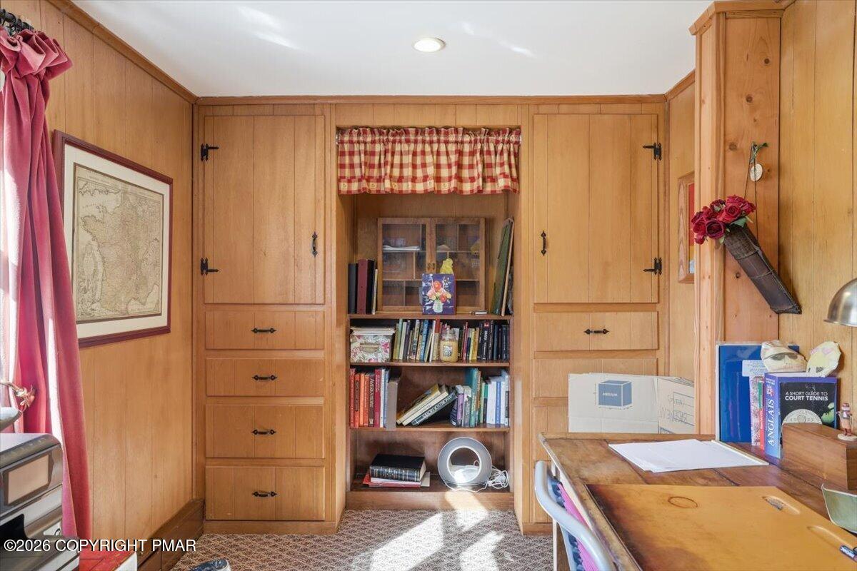 2487 Mountain Road Stroudsburg, PA 18360 - Photo 12 of 61 a bedroom with a bed and a book shelf