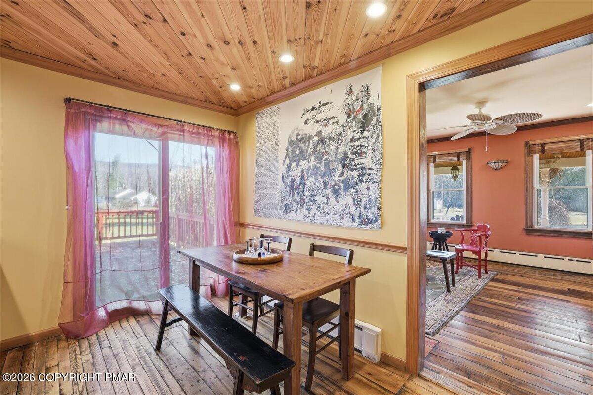 2487 Mountain Road Stroudsburg, PA 18360 - Photo 15 of 61 a view of a dining room with furniture window and wooden floor