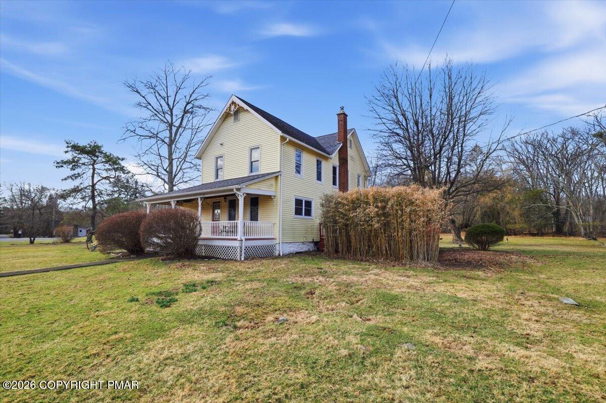 2487 Mountain Road Stroudsburg, PA 18360 - Photo 2 of 61 a view of a house with a yard