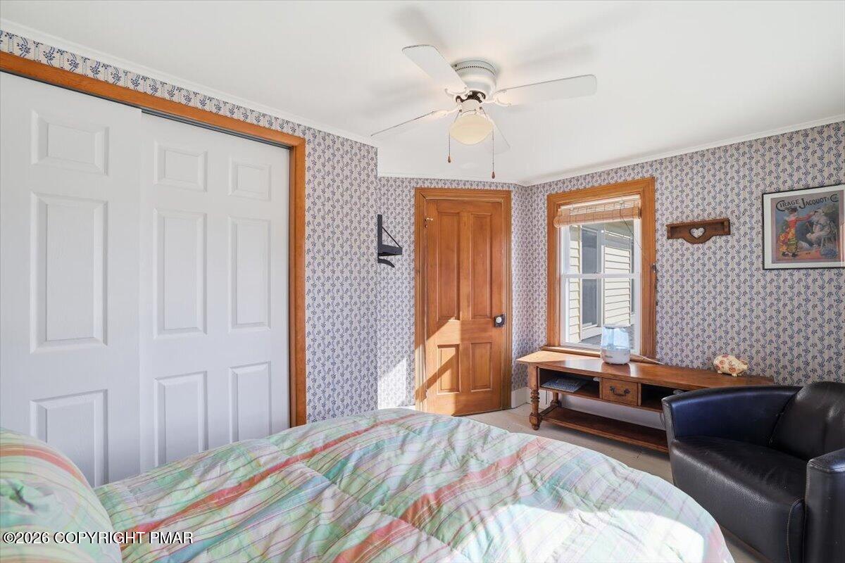 2487 Mountain Road Stroudsburg, PA 18360 - Photo 30 of 61 a bedroom with furniture and a window