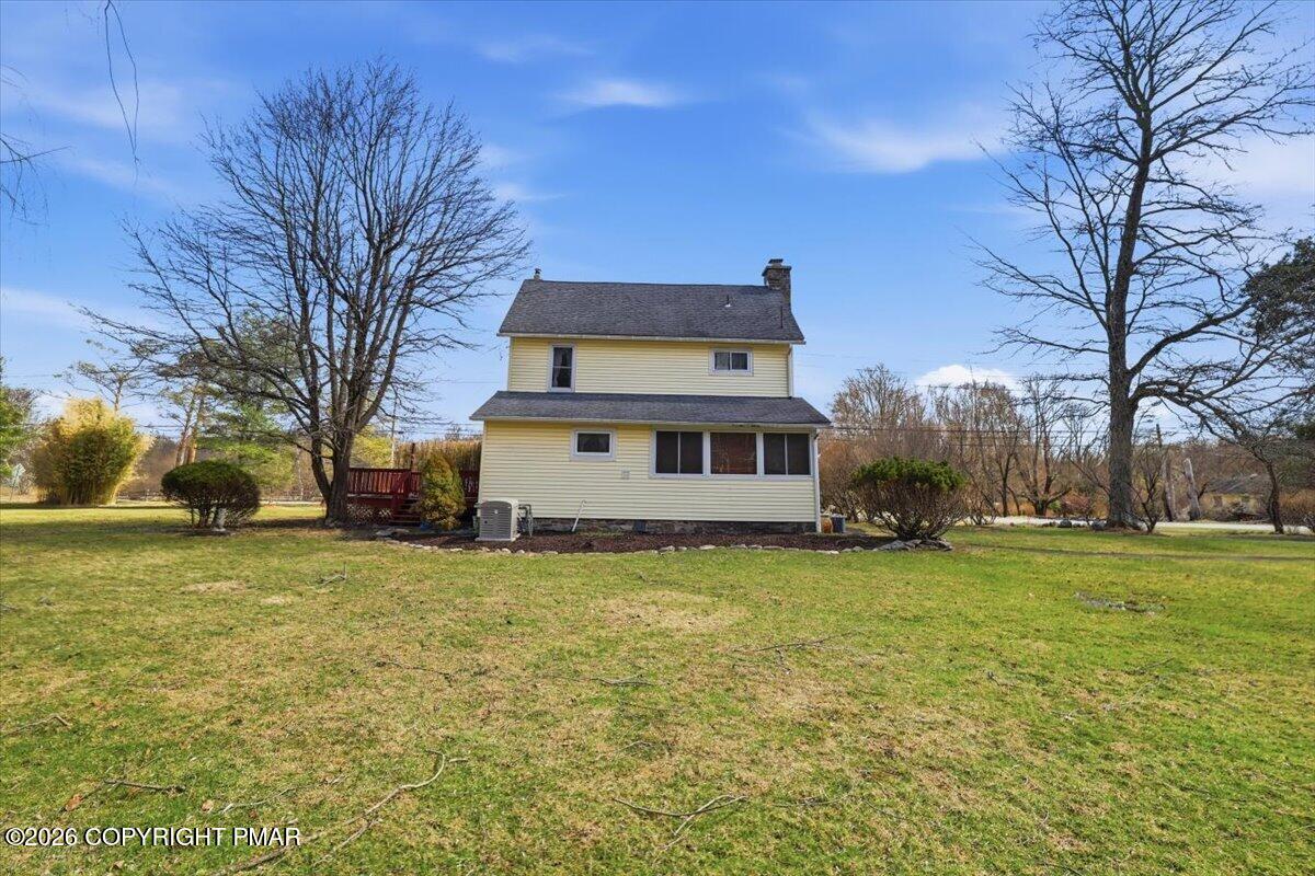 2487 Mountain Road Stroudsburg, PA 18360 - Photo 3 of 61 a house that has a big yard with large trees