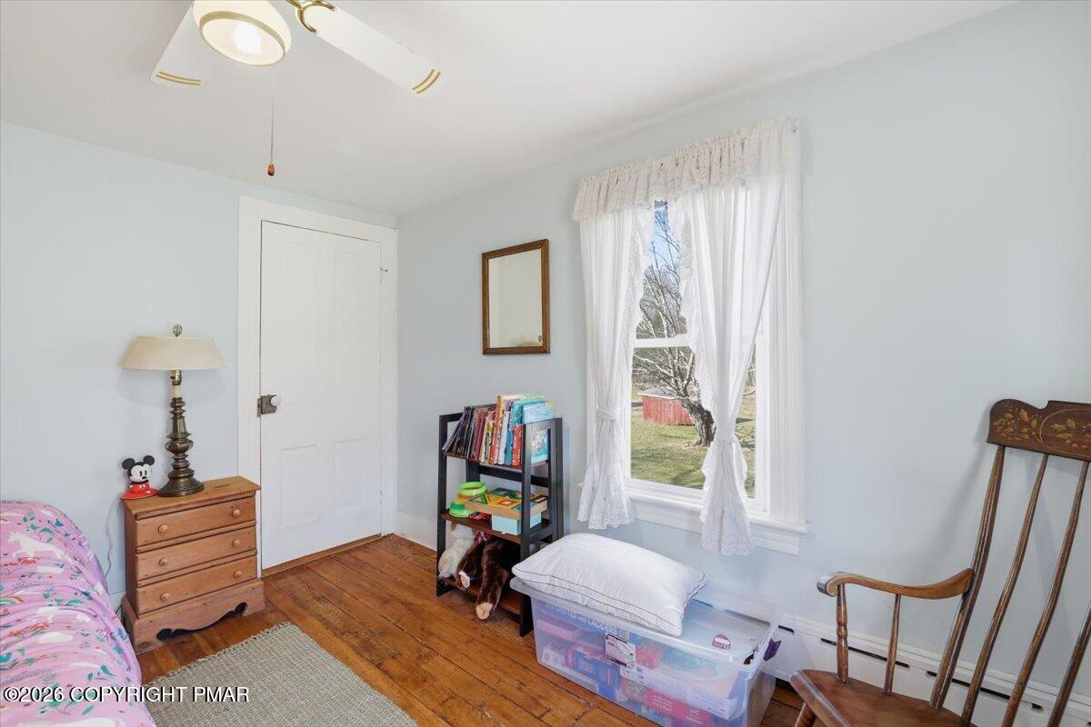 2487 Mountain Road Stroudsburg, PA 18360 - Photo 32 of 61 a living room with furniture and a window