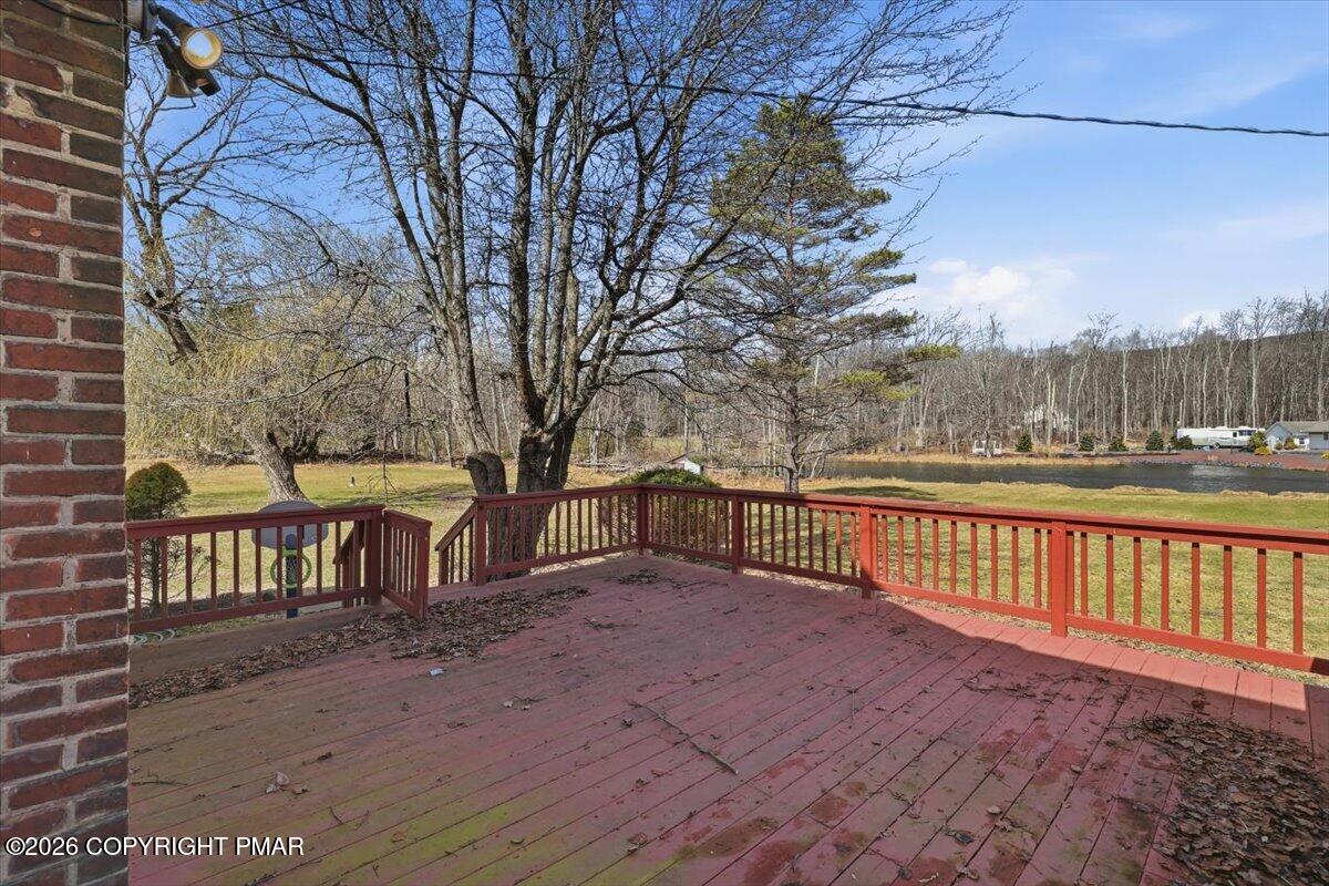 2487 Mountain Road Stroudsburg, PA 18360 - Photo 45 of 61 a view of a bench with wooden fence