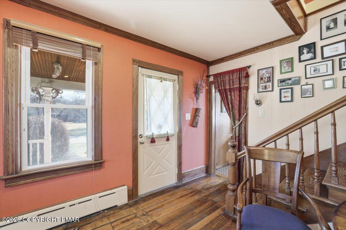 2487 Mountain Road Stroudsburg, PA 18360 - Photo 7 of 61 a view of an entryway with wooden floor and windows