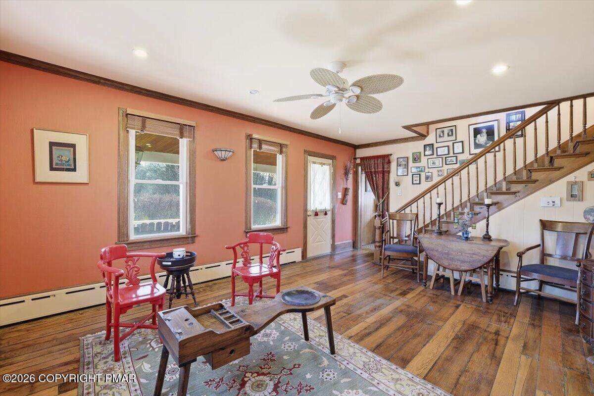 2487 Mountain Road Stroudsburg, PA 18360 - Photo 9 of 61 a living room with furniture and a wooden floor