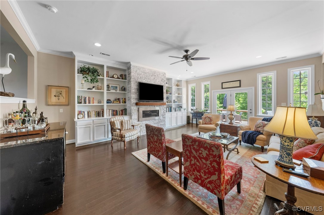 4060 Foxrun Road Powhatan, VA 23139 - Photo 16 of 50 a living room with fireplace furniture and a flat screen tv