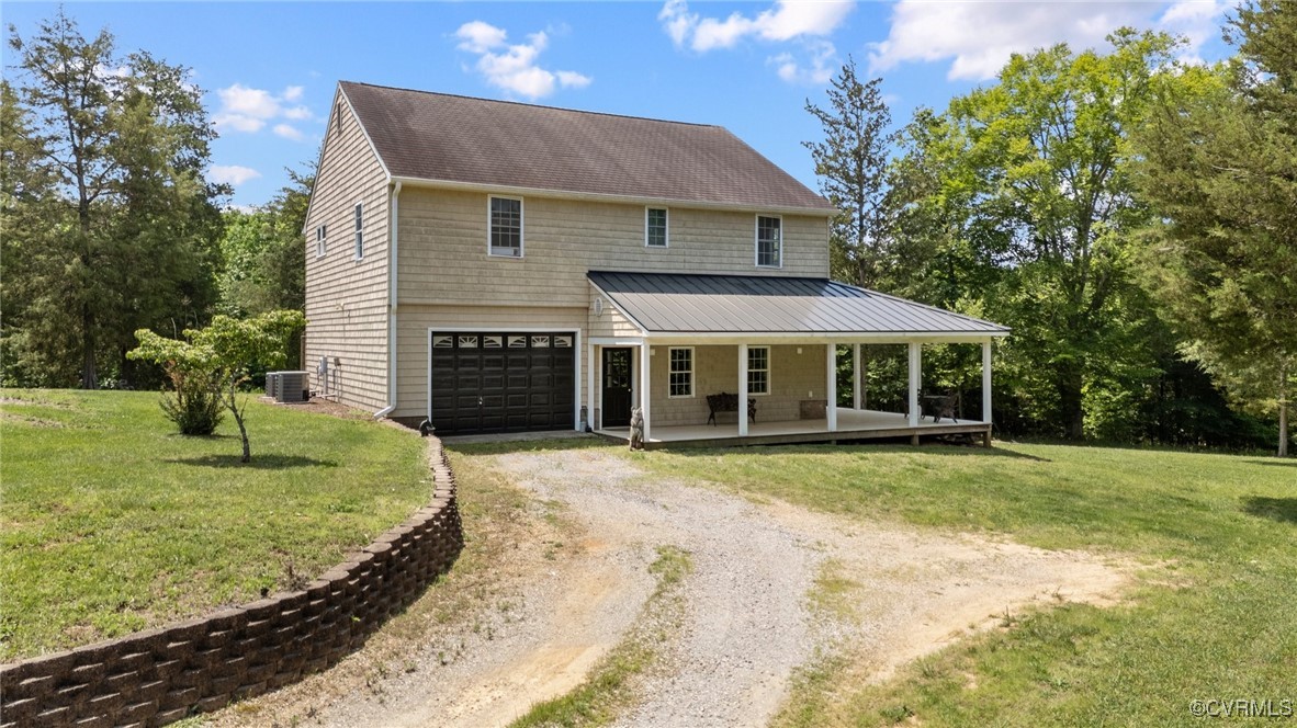 4060 Foxrun Road Powhatan, VA 23139 - Photo 32 of 50 a front view of a house with a yard