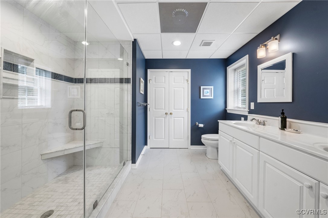 4060 Foxrun Road Powhatan, VA 23139 - Photo 37 of 50 a bathroom with a sink and mirror