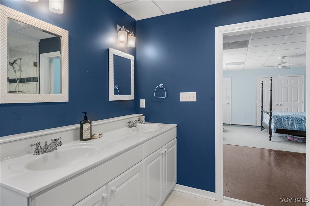 4060 Foxrun Road Powhatan, VA 23139 - Photo 38 of 50 a bathroom with a sink and a mirror