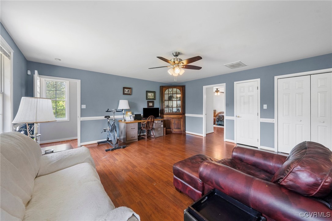 4060 Foxrun Road Powhatan, VA 23139 - Photo 41 of 50 a living room with furniture and wooden floor