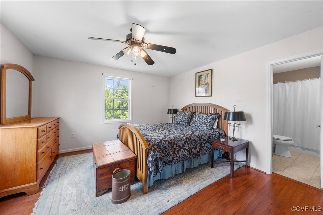 4060 Foxrun Road Powhatan, VA 23139 - Photo 42 of 50 a bedroom with furniture and a window