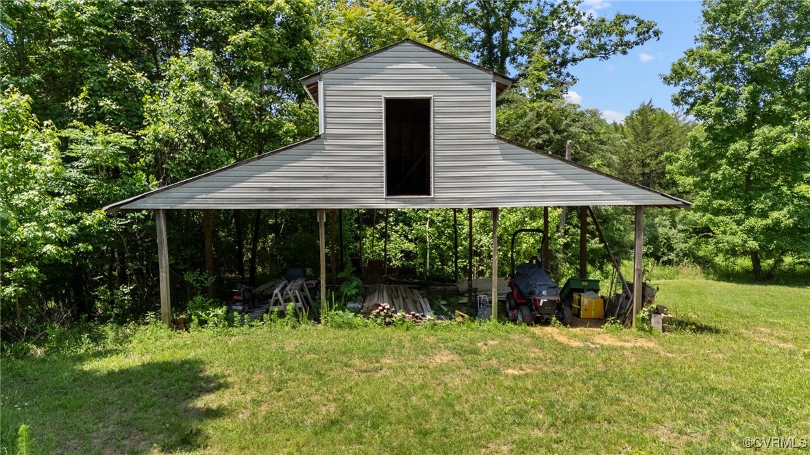 4060 Foxrun Road Powhatan, VA 23139 - Photo 47 of 50 a front view of a house with garden