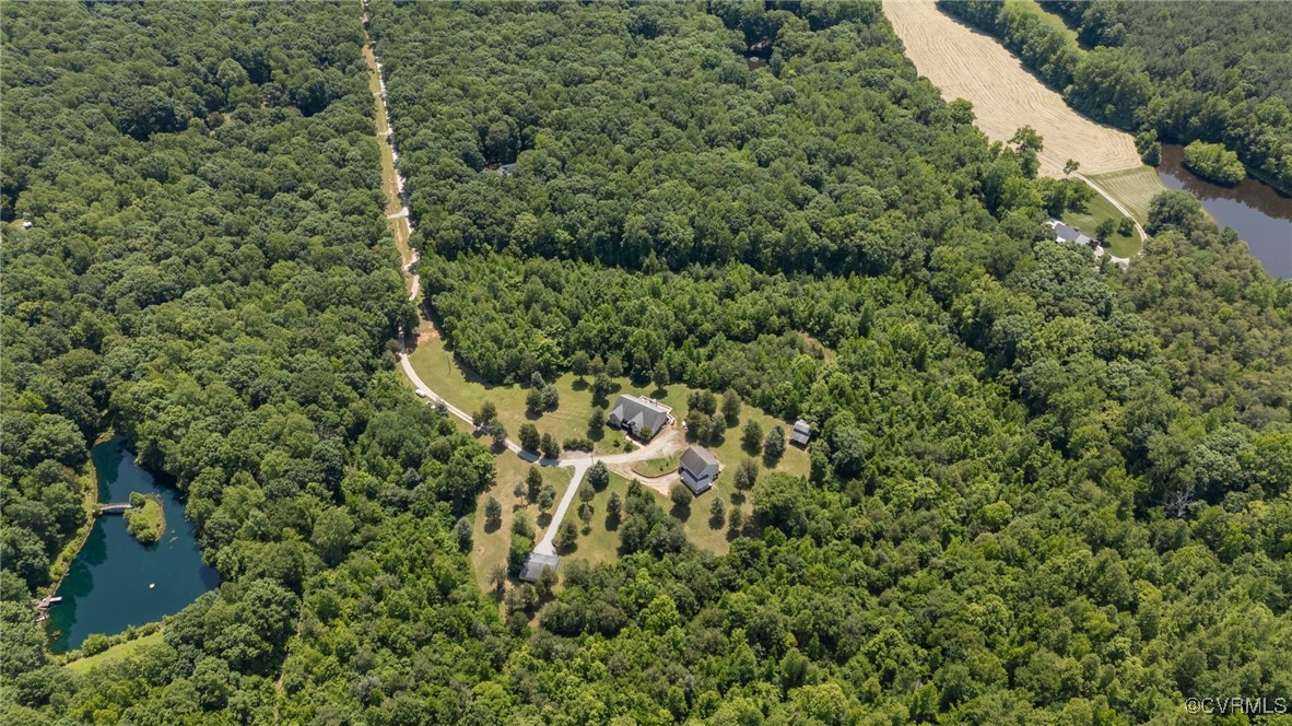 4060 Foxrun Road Powhatan, VA 23139 - Photo 49 of 50 an aerial view of residential house with outdoor space and trees all around