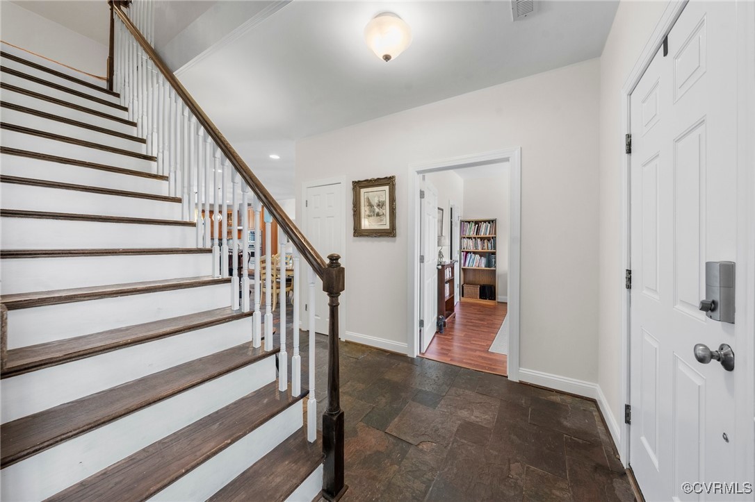 4060 Foxrun Road Powhatan, VA 23139 - Photo 5 of 50 a view of staircase with white walls and door