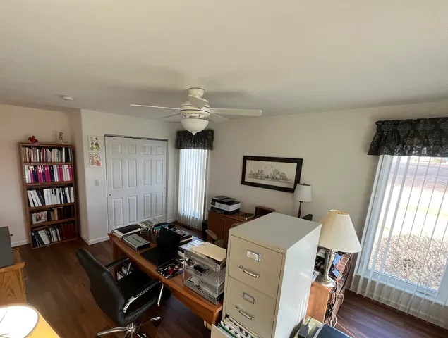 a room with furniture and a wooden floor