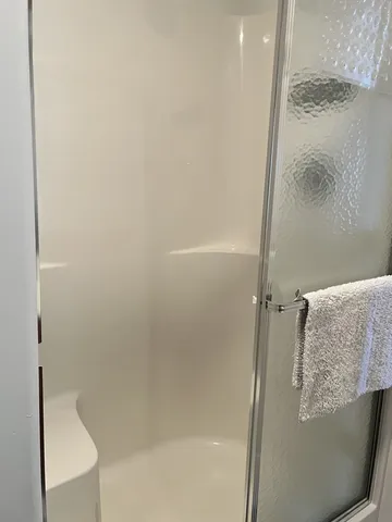 a bathroom with a sink and mirror