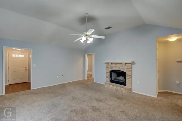 a view of a livingroom with a fireplace
