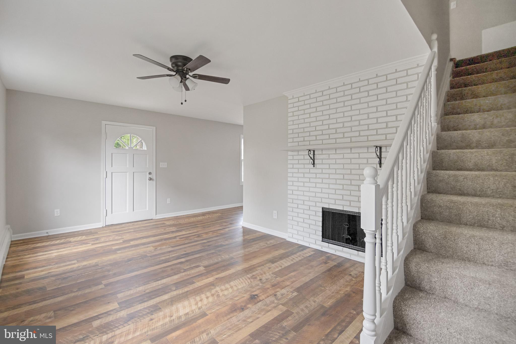 1220 Seven Oaks Road Halethorpe, MD 21227 - Photo 14 of 32 Brick Fireplace with Glass Doors