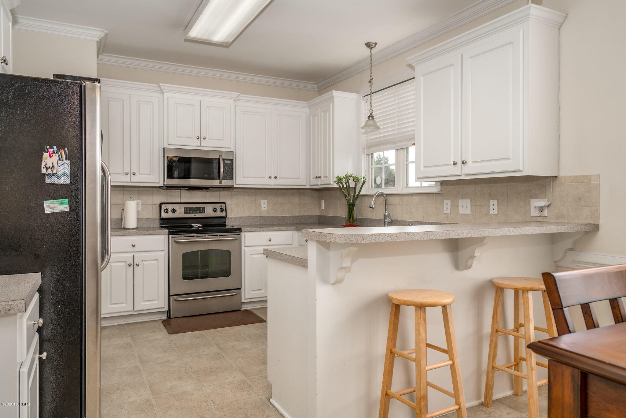 5959 Sandford Road Wilson, NC 27896 - Photo 11 of 36 Open kitchen with Stainless appliances
