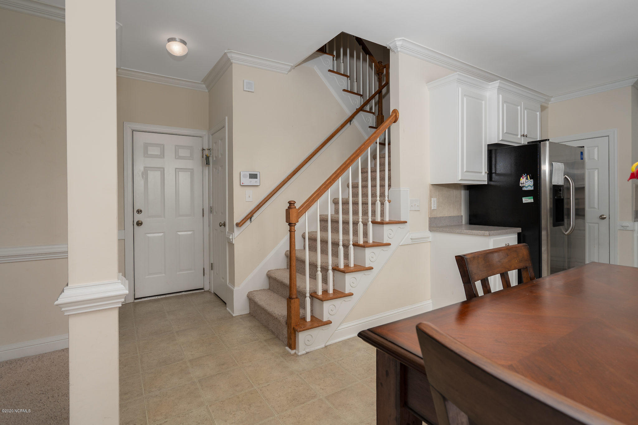 5959 Sandford Road Wilson, NC 27896 - Photo 14 of 36 Staircase off kitchen