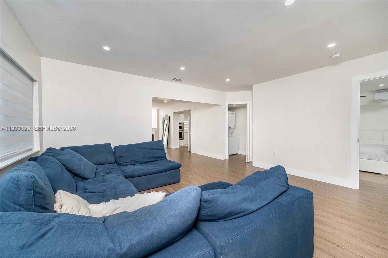 3077 Southwest 5th Street Miami, FL 33135 - Photo 14 of 25 a living room with furniture and a couch