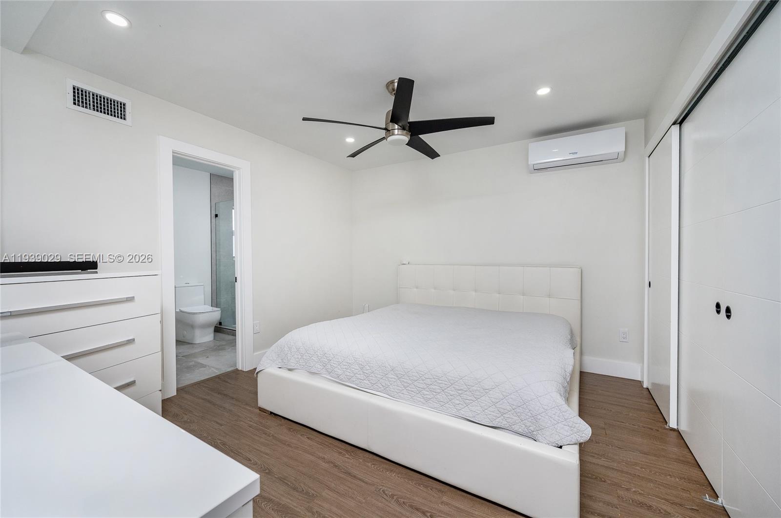 3077 Southwest 5th Street Miami, FL 33135 - Photo 17 of 25 a bedroom with a bed and a flat screen tv