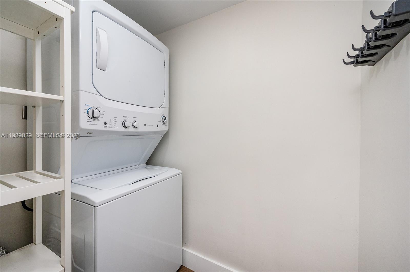 3077 Southwest 5th Street Miami, FL 33135 - Photo 20 of 25 a utility room with dryer and washer