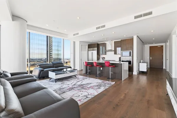 a living room with furniture and a couch