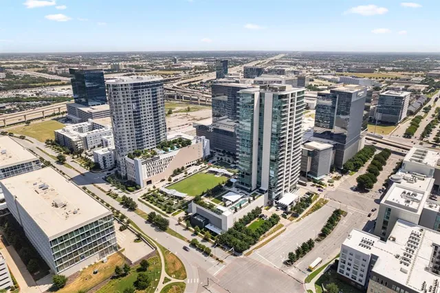 a view of a swimming pool with chairs in patio