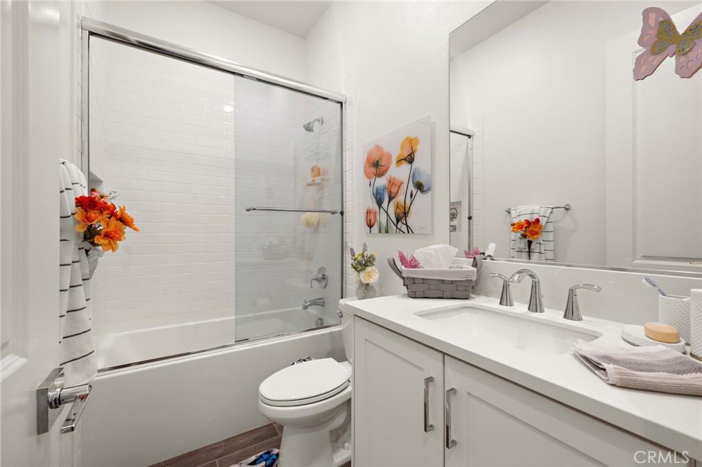756 Sunrise Road Rancho Mission Viejo, CA 92694 - Photo 18 of 32 a bathroom with a sink toilet and shower