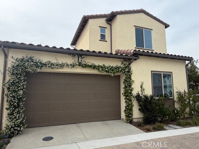 756 Sunrise Road Rancho Mission Viejo, CA 92694 - Photo 28 of 32 a front view of a house with a garden