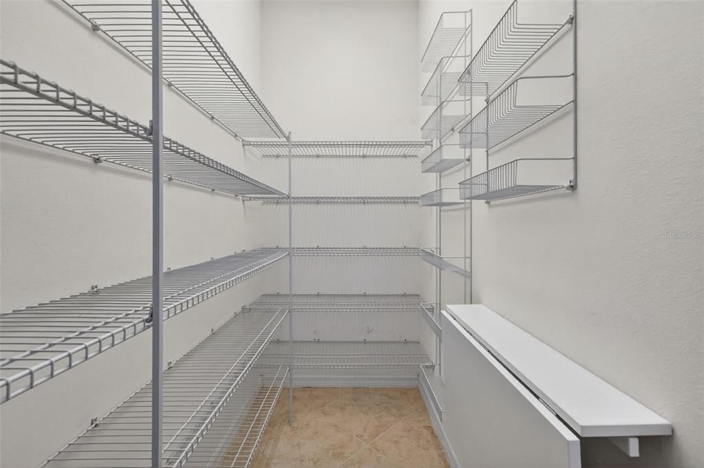 2389 Pawtucket Pass Mount Dora, FL 32757 - Photo 19 of 67 a view of a room with racks on the wall