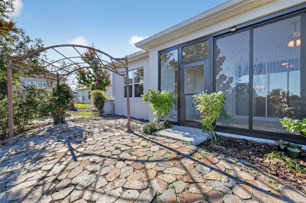2389 Pawtucket Pass Mount Dora, FL 32757 - Photo 45 of 67 a backyard of a house with lots of green space