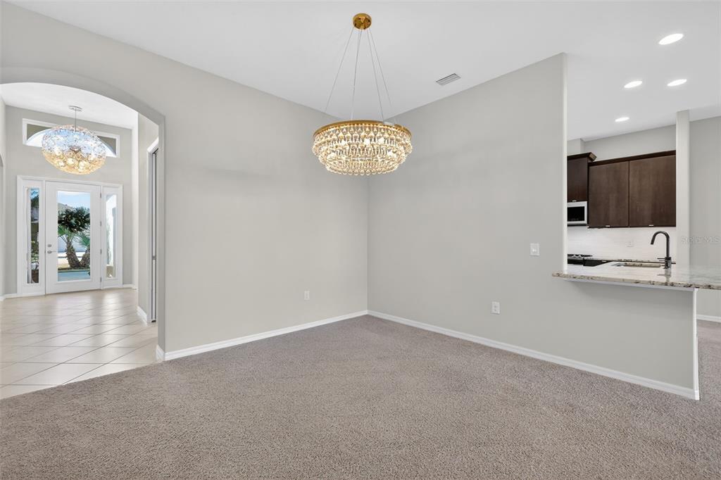 2389 Pawtucket Pass Mount Dora, FL 32757 - Photo 9 of 67 a view of an empty room with a window