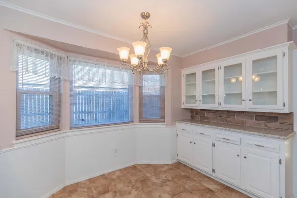 a view of a kitchen and window