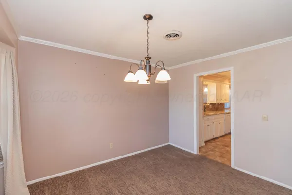 a view of a decorative light in a hallway