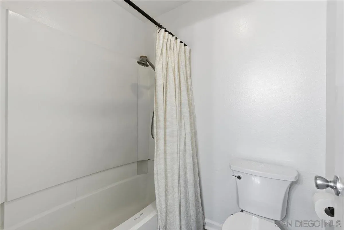 8825 Tamberly Way, Unit A Santee, CA 92071 - Photo 18 of 23 a bathroom with a shower and a toilet
