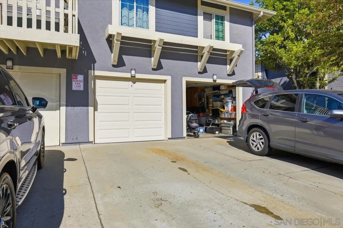 8825 Tamberly Way, Unit A Santee, CA 92071 - Photo 23 of 23 a view of a car park in front of building