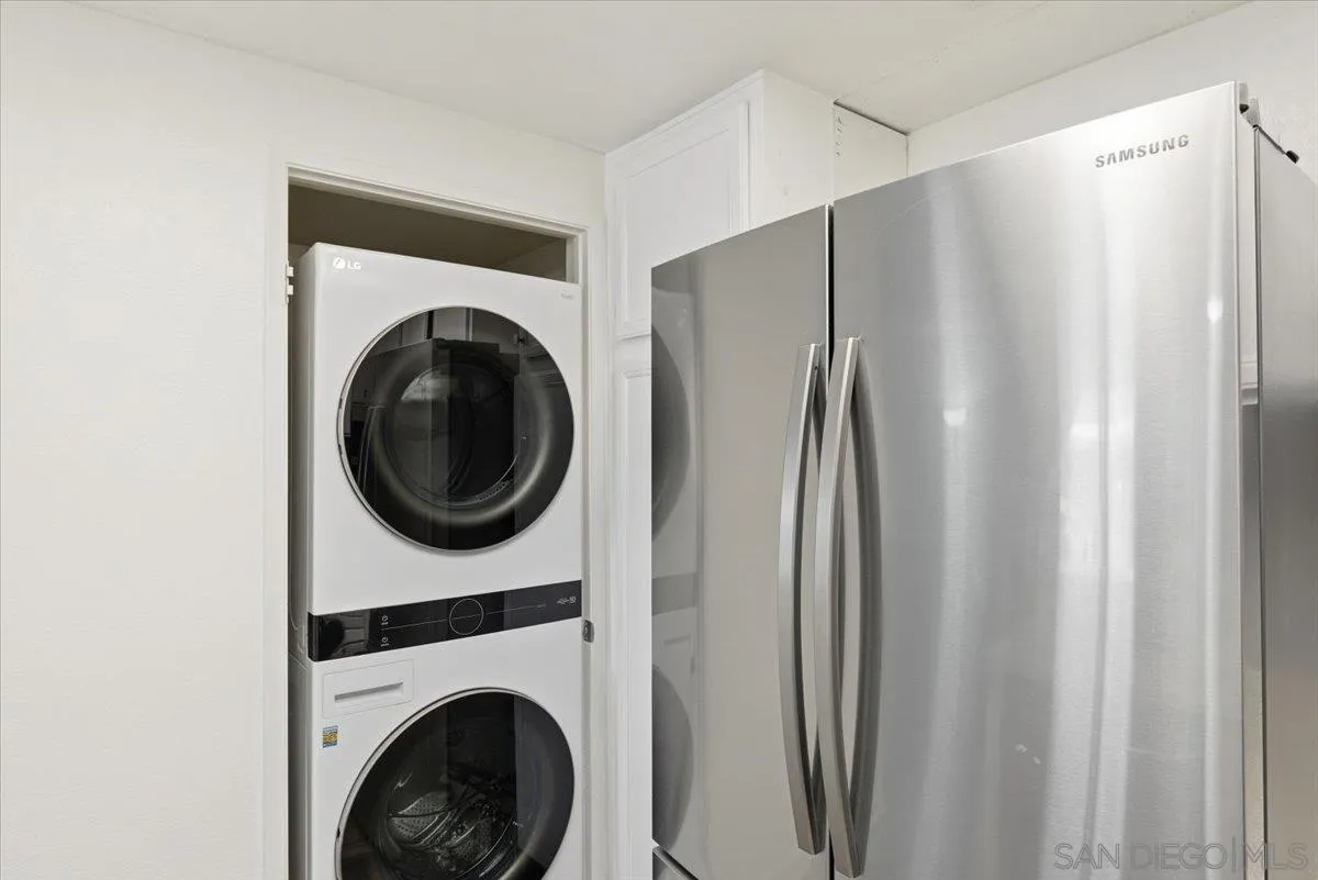 8825 Tamberly Way, Unit A Santee, CA 92071 - Photo 10 of 23 a close view of a utility room with dryer and washer