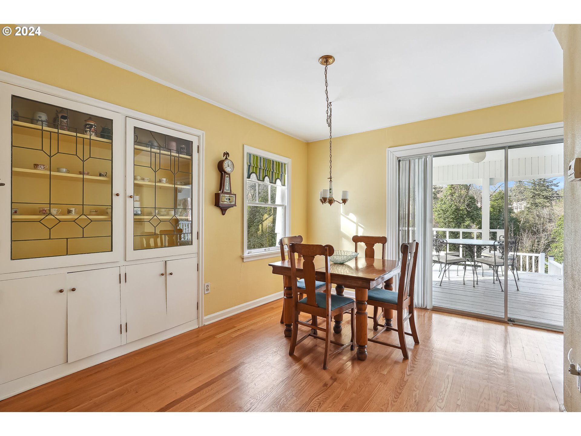 1628 Southwest College Street Portland, OR 97201 - Photo 11 of 25 a view of a dining room with furniture window and wooden floor