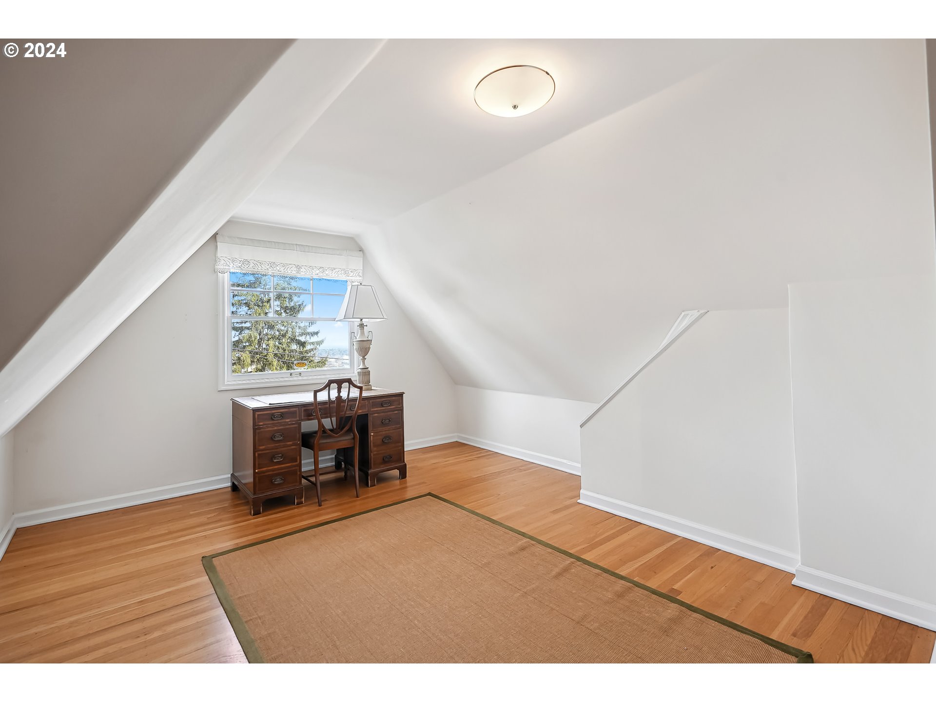 1628 Southwest College Street Portland, OR 97201 - Photo 17 of 25 view of living room with furniture and window